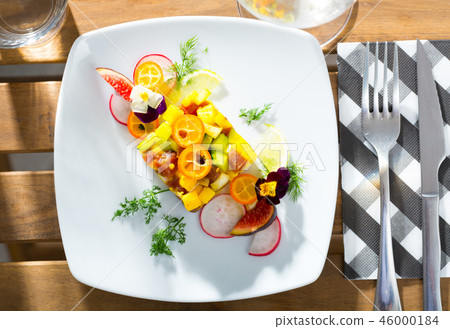 Top view of raw tuna tartare with mango and avocado 46000184