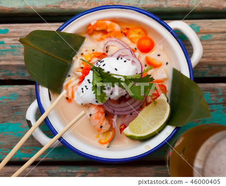 Top view of ceviche in Vietnamese style with coconut milk 46000405
