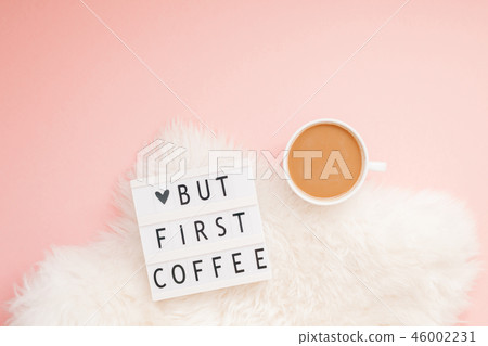 But first coffee text on lightbox with Coffee Cup But first coffee text on lightbox with Coffee Cup 46002231