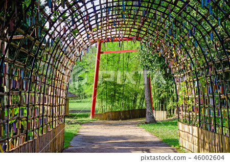 Arched bamboo tunnel arch with Torii gate 46002604