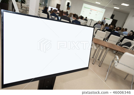 Monitor showing development plan organization against audience inconference room. Analysis Business Monitor showing development plan organization against audience inconference room. Analysis Business 46006346