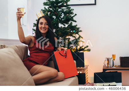 Christmas holiday happy woman with shopping bags at home. New Year Christmas holiday happy woman with shopping bags at home. New Year 46006436