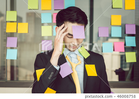 Colorful sticky notes over the businessman's clothes 46008758
