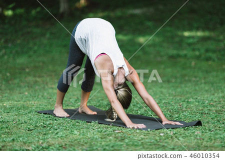 Yoga, sun salutation, downward facing dog 46010354