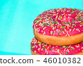 Bright tasty pink glazed donuts doughnuts on blue  46010382