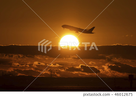 Sunrise and airplane 46012675