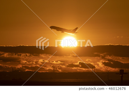 Sunrise and airplane 46012676