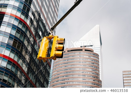 Yellow traffic lights against skyscrapers in New York 46013538