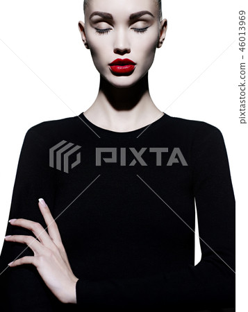 Elegant woman in geometric black and white background Elegant woman in geometric black and white background 46013969