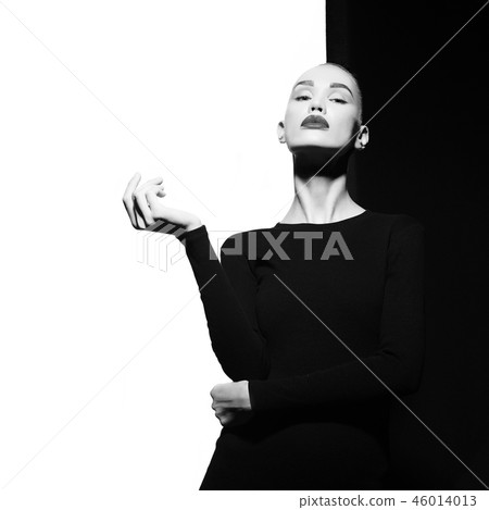 Elegant blode in geometric black and white background Elegant blode in geometric black and white background 46014013