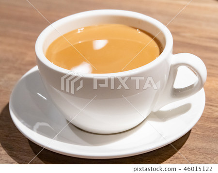 White coffee cup on plate White coffee cup on plate 46015122