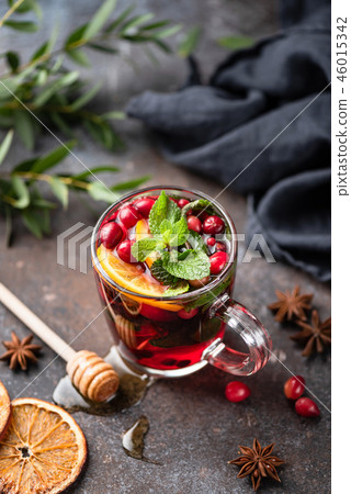 Hot spicy cranberry mulled wine or cranberry tea 46015342