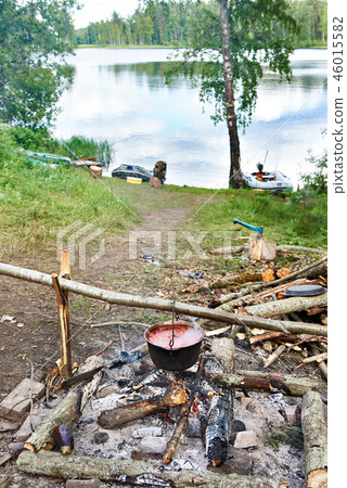 Bowler with soup on campfire Bowler with soup on campfire 46015582