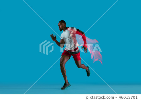 Full length portrait of active young muscular running man, 46015701