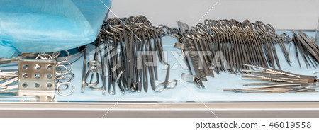 Sterile surgeon instruments. Steel surgery tools ready for use Sterile surgeon instruments. Steel surgery tools ready for use 46019558