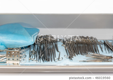 Sterile surgeon instruments. Steel surgery tools ready for use Sterile surgeon instruments. Steel surgery tools ready for use 46019560