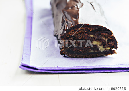 Chocolate roulade with lemon Kurd watered dark Chocolate roulade with lemon Kurd watered dark 46020218