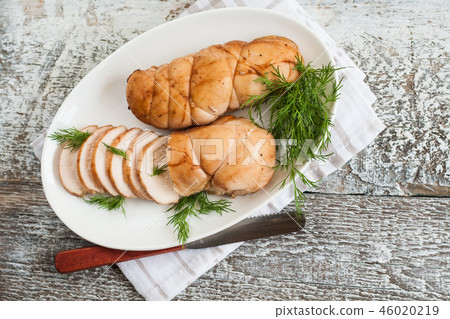 chopped meat fillet baked with herbs on a plate chopped meat fillet baked with herbs on a plate 46020219
