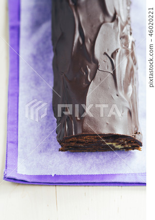 Chocolate roulade with lemon Kurd watered dark Chocolate roulade with lemon Kurd watered dark 46020221