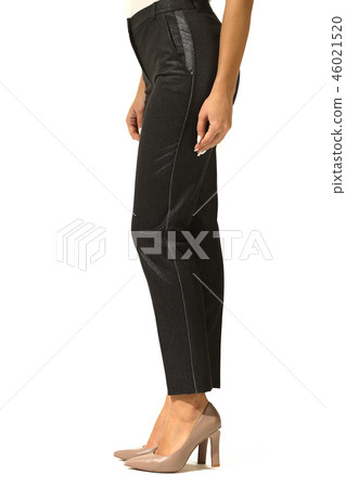 black trousers on model legs with white stiletto heels rear view 46021520