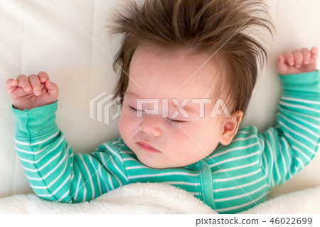 Baby boy sleeping Baby boy sleeping 46022699