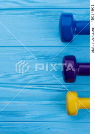 Colorful dumbbells with blank space. Colorful dumbbells with blank space. 46024601