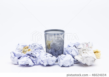 Crumpled Papers In Basket Over White Background Crumpled Papers In Basket Over White Background 46024834
