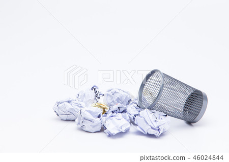 Crumpled Papers In Basket Over White Background Crumpled Papers In Basket Over White Background 46024844