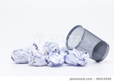 Crumpled Papers In Basket Over White Background 46024846