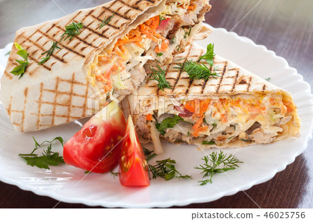 Fresh Shawarma grilled in a white dish Fresh Shawarma grilled in a white dish 46025756