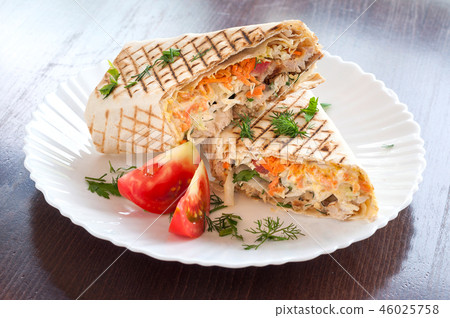 Fresh Shawarma grilled in a white dish 46025758