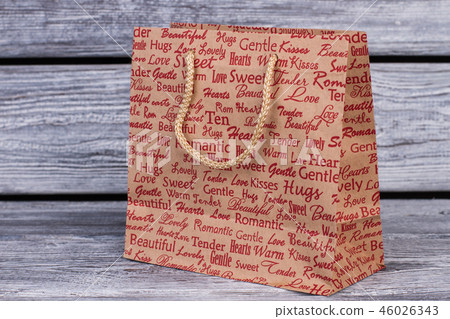 Shopping bag on wooden background. 46026343