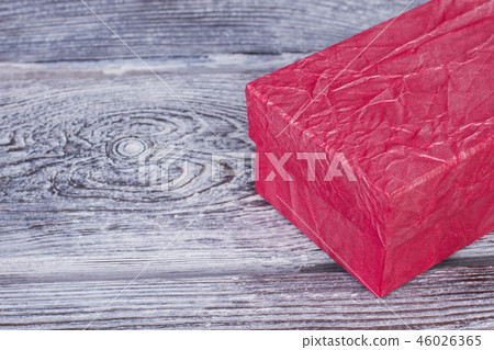 Beautiful gift box on wooden background. Beautiful gift box on wooden background. 46026365