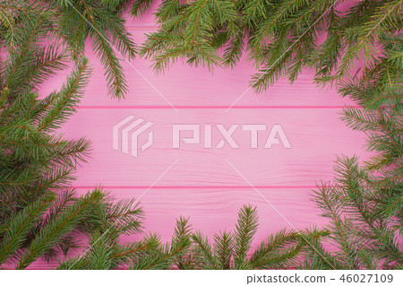 Christmas green framework on pink background. 46027109
