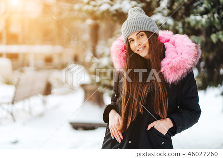 Young beautiful woman at winter city 46027260