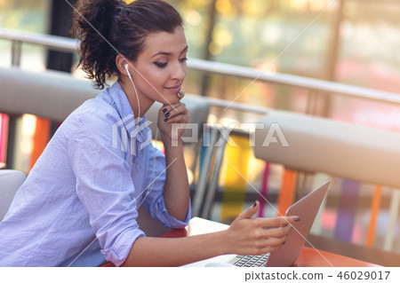 Mixed race female performing business negotiations on video chat. Telecommuting concept. 46029017