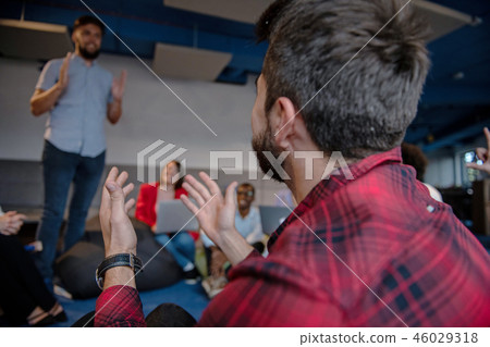 Group of businesspeople working together and preparing business plan 46029318