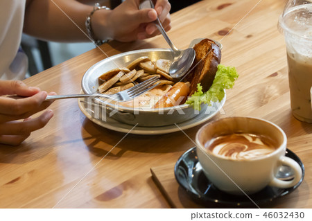 Thai pan-fried egg with toppings. 46032430