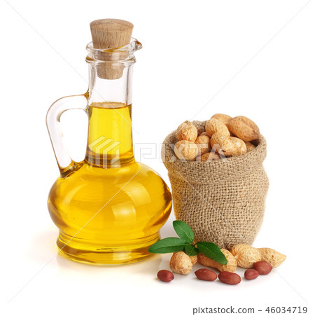peanut oil in a glass bottle with peanuts in bag peanut oil in a glass bottle with peanuts in bag 46034719
