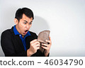 businessman gasping in shock money in his walle 46034790