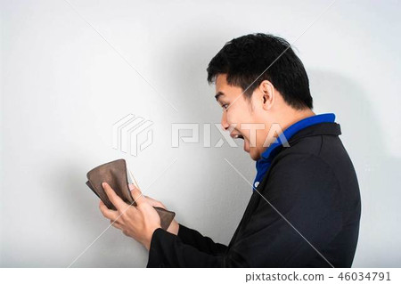 businessman gasping in shock money in his walle 46034791