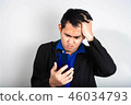 Furious businessman outraged on the phone 46034793