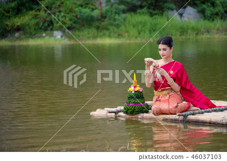 Thai girl wearing red Thai traditional dress 46037103