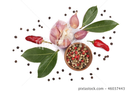 mix of garlic, hot pepper, peppercorn and laurel leaf isolated on white background. Top view 46037443
