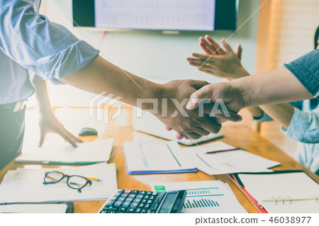 Business people shaking hands Business people shaking hands 46038977