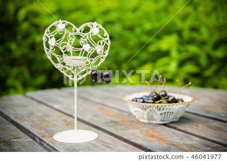 fresh red cherries berries on the wooden table fresh red cherries berries on the wooden table 46041977