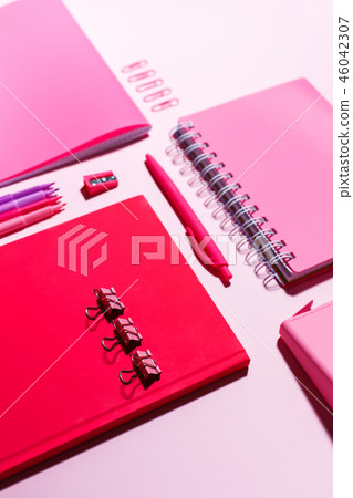 Stationery in pink tones on a pink background Stationery in pink tones on a pink background 46042307
