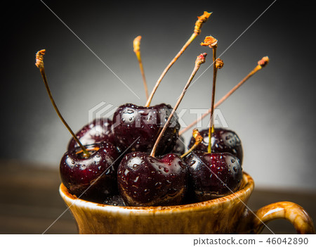 fresh red cherries berries on the wooden table fresh red cherries berries on the wooden table 46042890