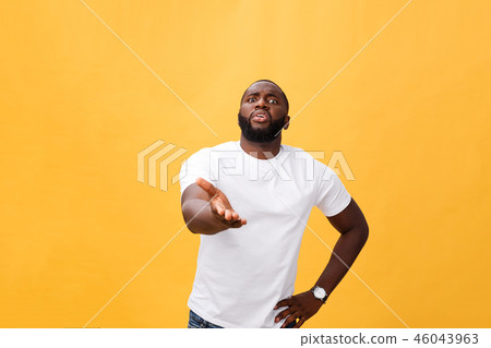 Portrait shock and annoyed displeased young man raising hands up to say no stop right there isolated 46043963