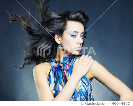 Beautiful woman with bright makeup and manicure 46044867